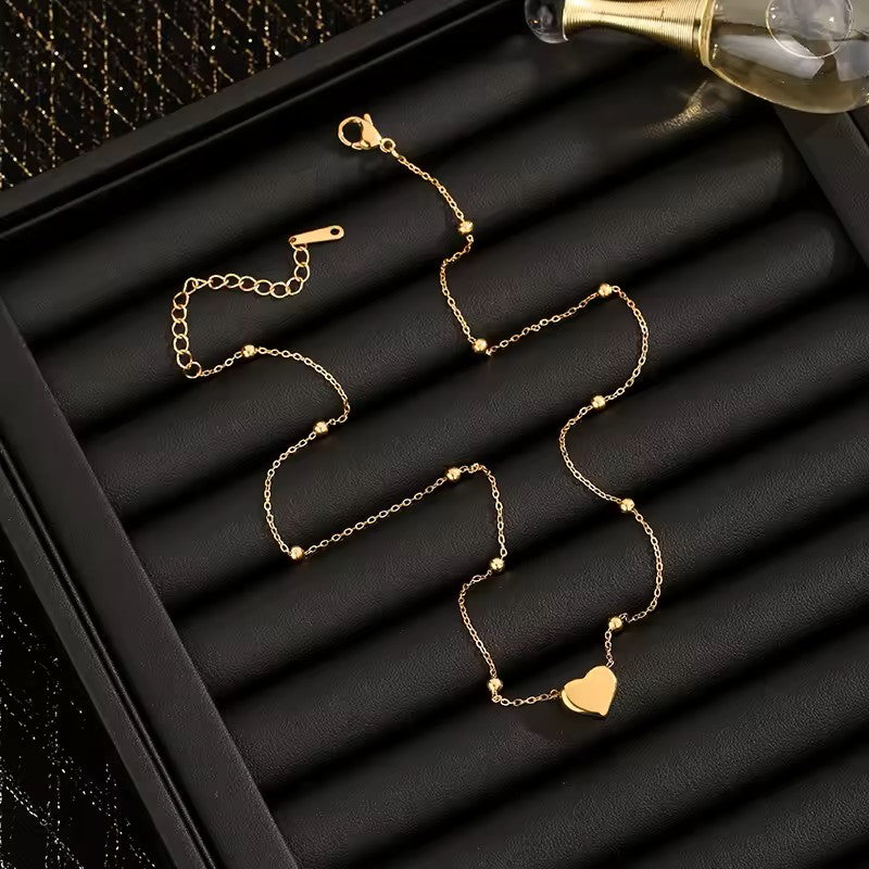 BRACCIALE E COLLANA A CATENA A FORMA DI CUORE COLOR ORO