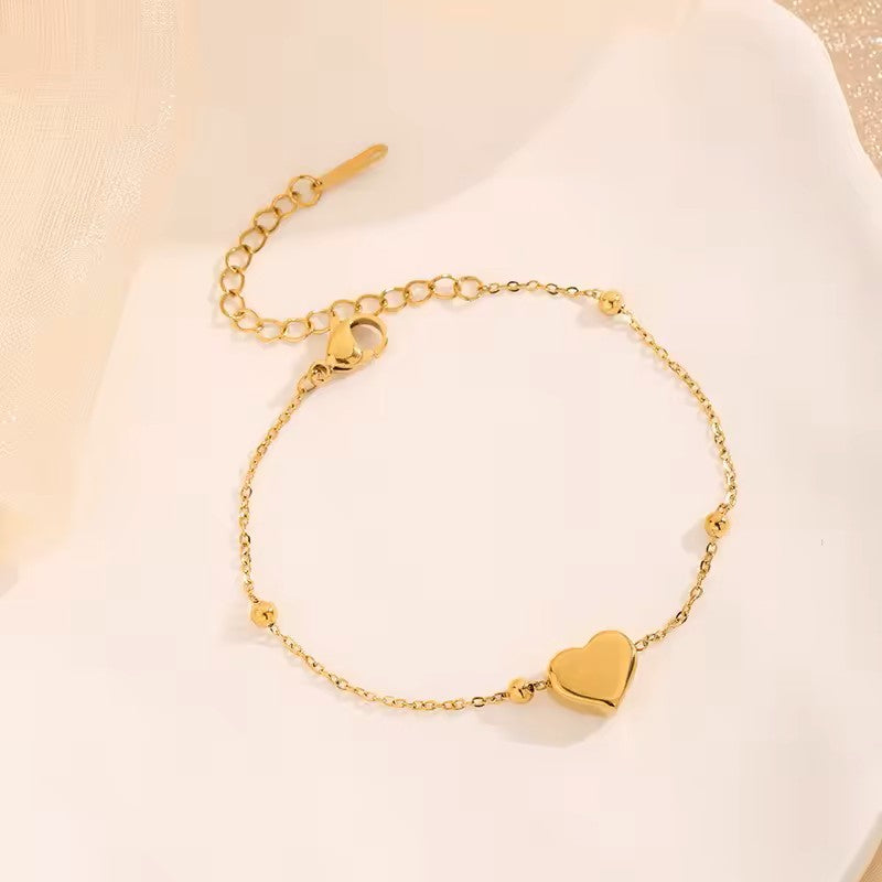 BRACCIALE E COLLANA A CATENA A FORMA DI CUORE COLOR ORO