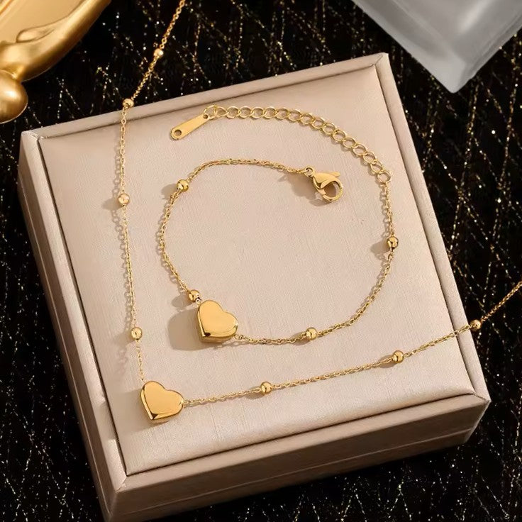 BRACCIALE E COLLANA A CATENA A FORMA DI CUORE COLOR ORO